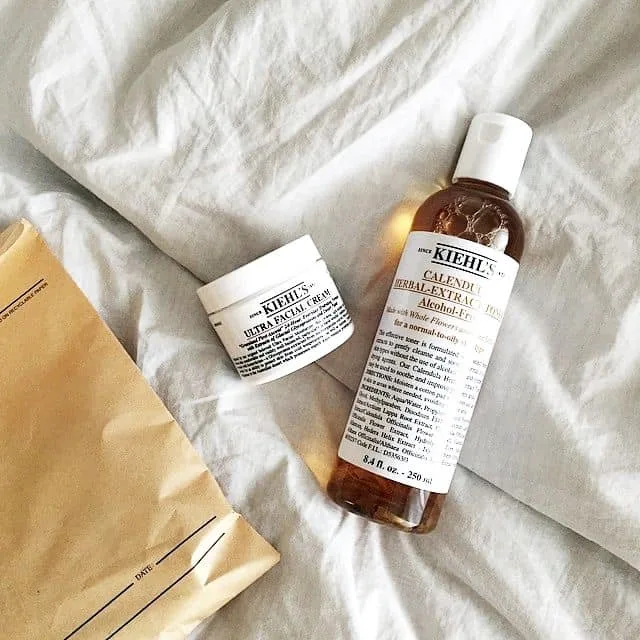Kiehl's Ultra Facial Cream and Calendula toner on linen
