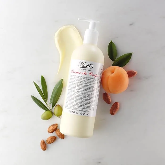 Kiehl's Creme de Corps with almonds and apricot on marble